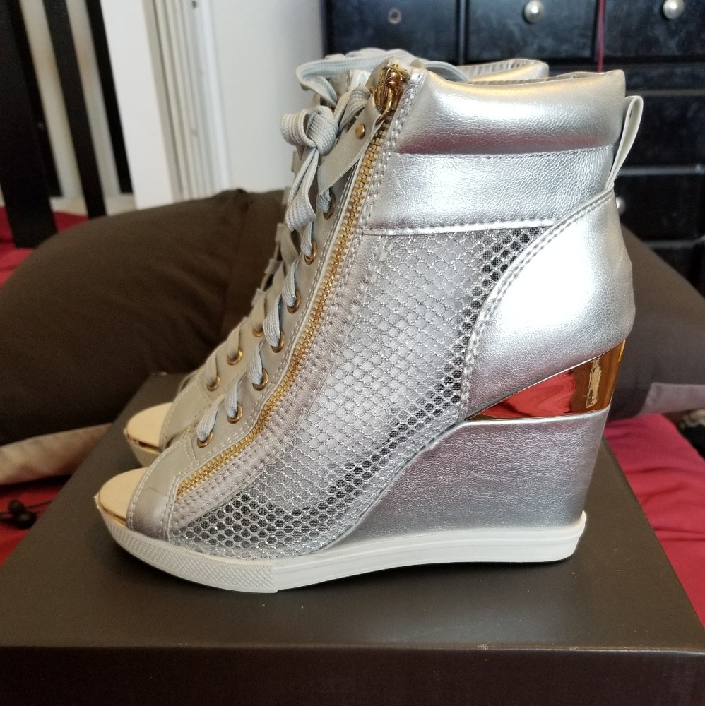Never worn, silver with gold trim sneaker wedges